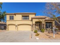 Two-story house with three-car garage, landscaping, and a for sale sign at 2128 E Leo Pl, Chandler, AZ 85249