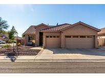 Beautiful two-story home with landscaped front yard and two-car garage at 5317 W Glenview Pl, Chandler, AZ 85226