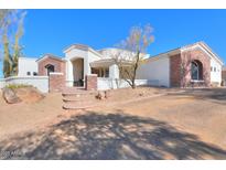 Two-story home with stone accents and welcoming entryway at 922 E Desert Hills Estate Dr, Phoenix, AZ 85086