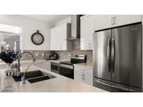 Modern kitchen with stainless steel appliances and island at 16510 N 92Nd St # 1006, Scottsdale, AZ 85260