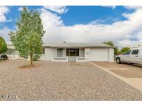 Ranch style home with gravel driveway and carport at 152 N 63Rd St, Mesa, AZ 85205