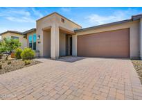 Single-story home with two-car garage and landscaped front yard at 29316 N Lone Pine Ln, Rio Verde, AZ 85263