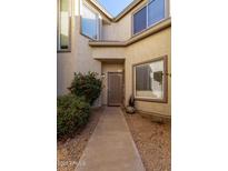Inviting front entry with a well-maintained walkway at 4301 N 21St St # 24, Phoenix, AZ 85016