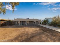 Newly renovated single story home with a covered porch at 6443 E Alder Ave, Mesa, AZ 85206