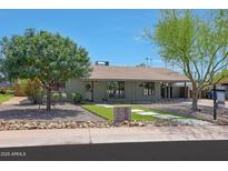 Charming single story home with landscaped front yard at 2319 E Earll Dr, Phoenix, AZ 85016