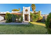 Charming Spanish-style home with a well-manicured lawn at 3126 E Monte Vista Rd, Phoenix, AZ 85008