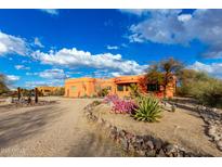 Southwest style home with landscaped desert front yard at 31825 N 141St St, Scottsdale, AZ 85262