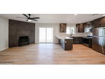 Modern kitchen with stainless steel appliances and ample counter space at 3226 W Julie Dr, Phoenix, AZ 85027
