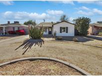 Charming bungalow with updated facade and landscaping at 309 E Weldon Ave, Phoenix, AZ 85012