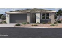Single-story home with gray garage door and desert landscaping at 7611 W Avenida Del Rey --, Peoria, AZ 85383