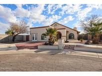 Single-story home with brick driveway and desert landscaping at 8749 E Willetta St, Scottsdale, AZ 85257