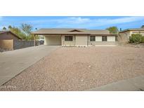 Single story home with carport and gravel landscaping at 17112 E La Pasada Dr, Fountain Hills, AZ 85268