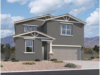 Two-story house with gray siding, stone accents, and a two-car garage at 47462 W Kenner Dr, Maricopa, AZ 85139