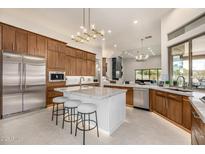 Spacious kitchen with island, stainless steel appliances, and ample cabinetry at 9655 N 130Th St, Scottsdale, AZ 85259