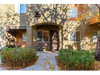 Attractive exterior of a two-story townhome with a walkway and landscaping at 1718 W Colter St # 193, Phoenix, AZ 85015