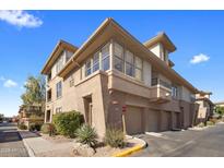 Three-story building with multiple units and parking at 19777 N 76Th St # 2292, Scottsdale, AZ 85255