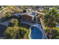 House with pool and landscaping, offering a bird's eye view of the property at 2235 E Vista Ave, Phoenix, AZ 85020