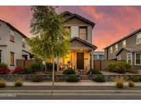 Two-story home with landscaped front yard and modern design at 1926 W Lariat Ln, Phoenix, AZ 85085