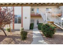 Inviting condo exterior with walkway and landscaping at 205 N 74Th St # 122, Mesa, AZ 85207