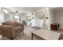 Bright living room with hardwood floors and comfortable seating at 2524 S El Paradiso -- # 76, Mesa, AZ 85202