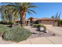 Single story home with desert landscaping and a two-car garage at 2747 Leisure World --, Mesa, AZ 85206