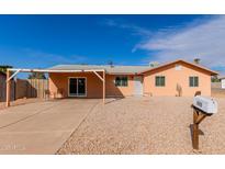 Charming single story home with carport and landscaped yard at 632 N 95Th St, Mesa, AZ 85207