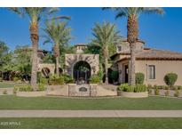 Mediterranean style home with gated entry and manicured landscaping at 6876 S Star Dr, Gilbert, AZ 85298