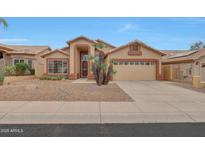 Single-story home with desert landscaping and two-car garage at 7261 E Black Rock Rd, Scottsdale, AZ 85255