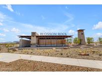 Blossom Rock community entrance with stone and wood details at 1454 W J Waltz Way, Apache Junction, AZ 85120