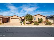 Charming single-story home featuring desert landscaping, paver driveway, and two-car garage at 5626 E Sleepy Ranch Rd, Cave Creek, AZ 85331