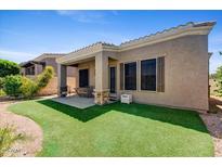 Covered patio and artificial turf backyard at 6202 E Mckellips Rd # 83, Mesa, AZ 85215