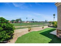 Home backs to golf course with putting green views at 6202 E Mckellips Rd # 83, Mesa, AZ 85215