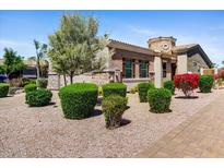 Well-maintained landscaping surrounds this beautiful home at 6202 E Mckellips Rd # 83, Mesa, AZ 85215