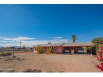 Ranch style home with carport and spacious yard at 3616 S 67Th Ave, Phoenix, AZ 85043