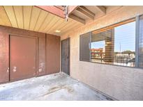 Exterior view of condo building showcasing private entrance and patio at 3810 N Maryvale Pkwy # 1060, Phoenix, AZ 85031