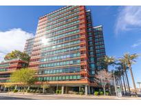 Modern high-rise building with city views and palm trees at 4808 N 24Th St # 605, Phoenix, AZ 85016