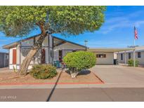 Inviting single-story home with carport and landscaped yard at 8500 E Southern Ave # 126, Mesa, AZ 85209