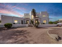 Stunning two-story home with stucco exterior and desert landscaping at 8158 E Plymouth St, Mesa, AZ 85207