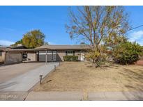 Single-story home with carport and landscaped yard at 616 W Toledo St, Chandler, AZ 85225