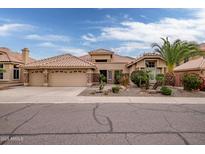 Beautiful single-story home with three-car garage and desert landscaping at 1757 E Saltsage Dr, Phoenix, AZ 85048