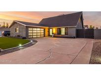 Stunning curb appeal! This updated home features a modern facade, new landscaping, and a spacious driveway at 8556 E Sage Dr, Scottsdale, AZ 85250