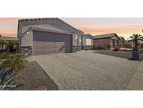 House exterior featuring a paved driveway and landscaping at 2651 N Lema Dr, Mesa, AZ 85215
