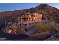 Luxury home with stunning mountain views and a long driveway at 37300 N School House Rd, Cave Creek, AZ 85331