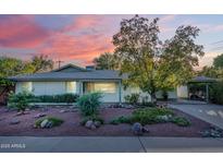 Charming single-story home with landscaped front yard at 8201 E Monterey Way, Scottsdale, AZ 85251