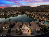 Luxury home with lake views and mountain backdrop at 16206 S 11Th Pl, Phoenix, AZ 85048