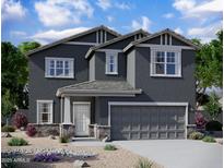 Two-story home with gray exterior, stone accents, and a two-car garage at 47665 W Cansados Rd, Maricopa, AZ 85139