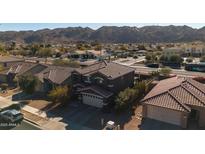 Two-story house aerial view, showcasing the property's curb appeal and neighborhood context at 109 E Milada Dr, Phoenix, AZ 85042