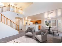 Spacious living room with high ceilings and open floor plan at 1552 E Oak Rd, San Tan Valley, AZ 85140