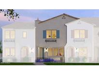 Two-story townhome with light-gray siding, teal shutters, and landscaping at 2658 S Sulley Dr # 109, Gilbert, AZ 85295