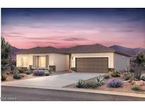 One-story house with brown roof,garage and desert landscaping at 6706 W Victory Way, Florence, AZ 85132